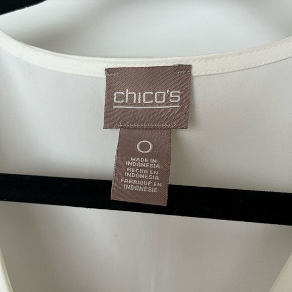 Chico’s white sleeveless v-neck blouse, jabot in front, slits at sides, size 0. - Picture 5 of 7
